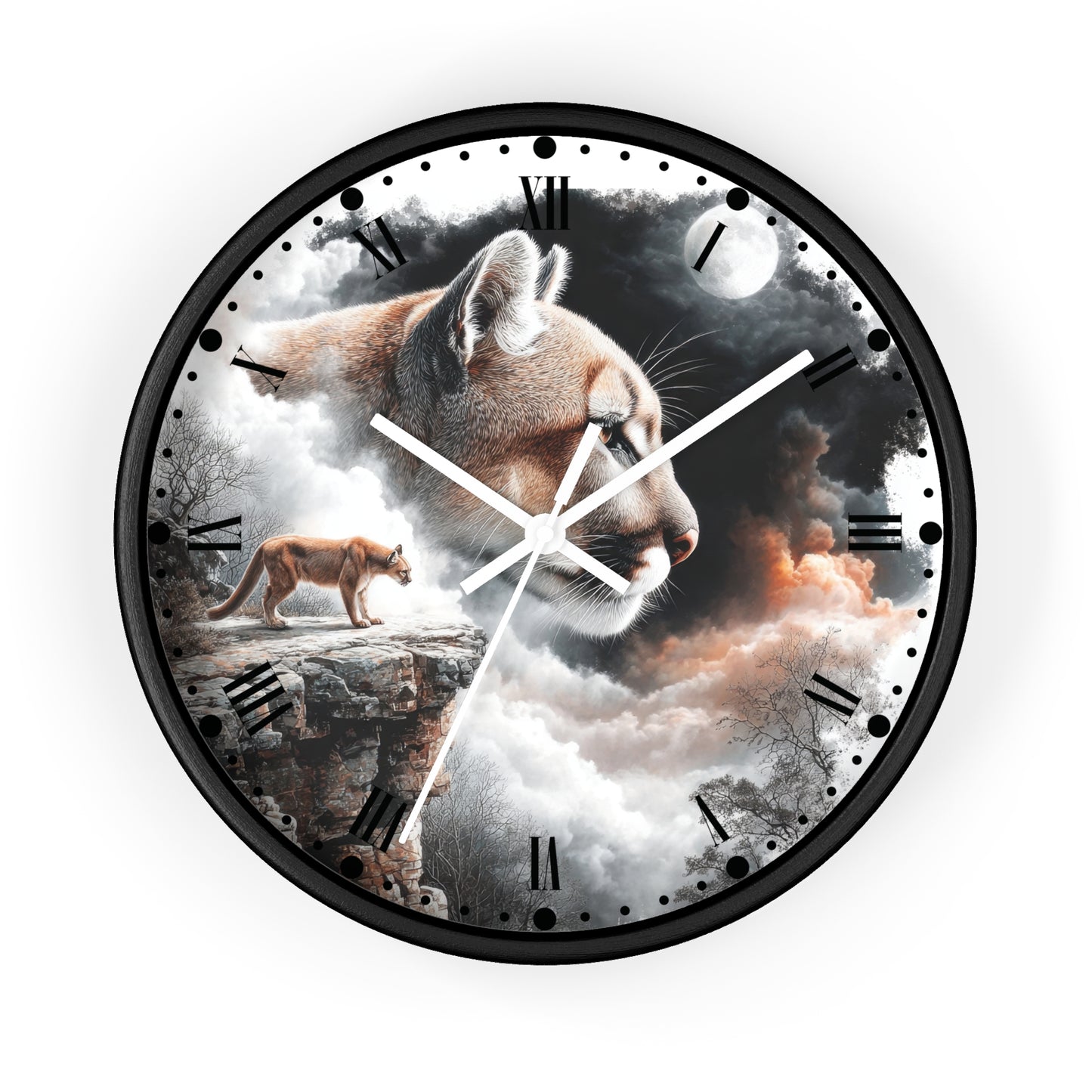 A round wall clock with a black frame and a printed fantasy-style design featuring a large mountain lion face, a smaller lion walking on a cliff, clouds, moon, and dark sky. The clock is shown against a plain white background.