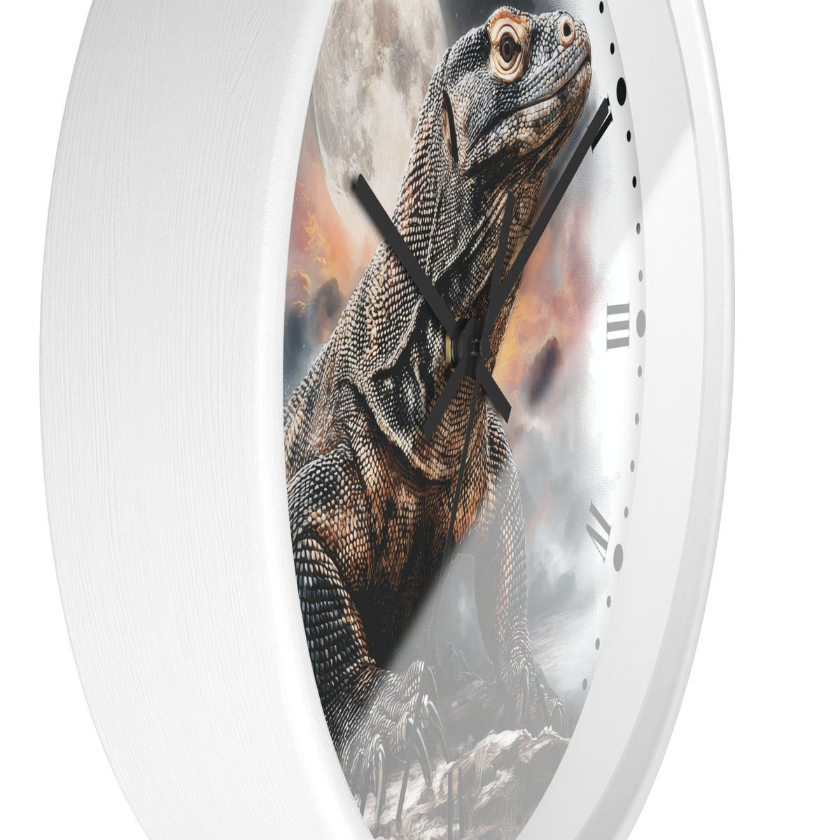 A white oval wall clock featuring a detailed graphic print of a prehistoric lizard Komodo dragon rising from rocky terrain against a smoky, fiery background. The clock has black hands and Roman numeral hour markers on a clean white background.