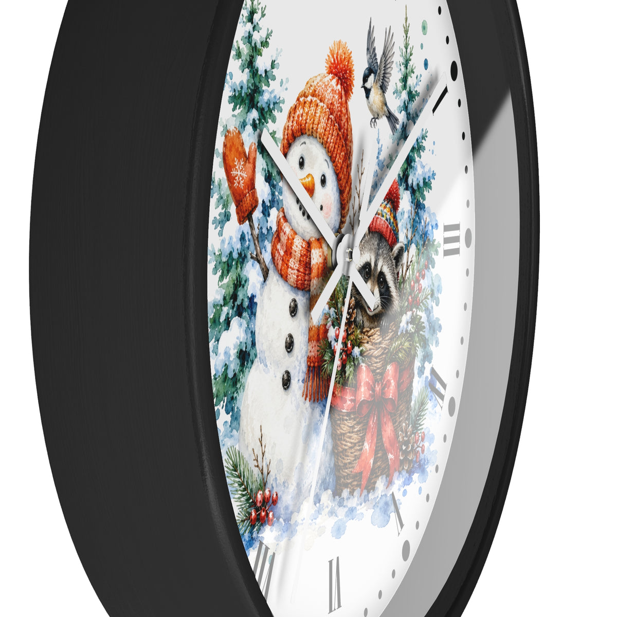A round wall clock with a black frame and a white face featuring a winter holiday illustration of a snowman in an orange knit hat and scarf, a raccoon, evergreen trees, and a bird.