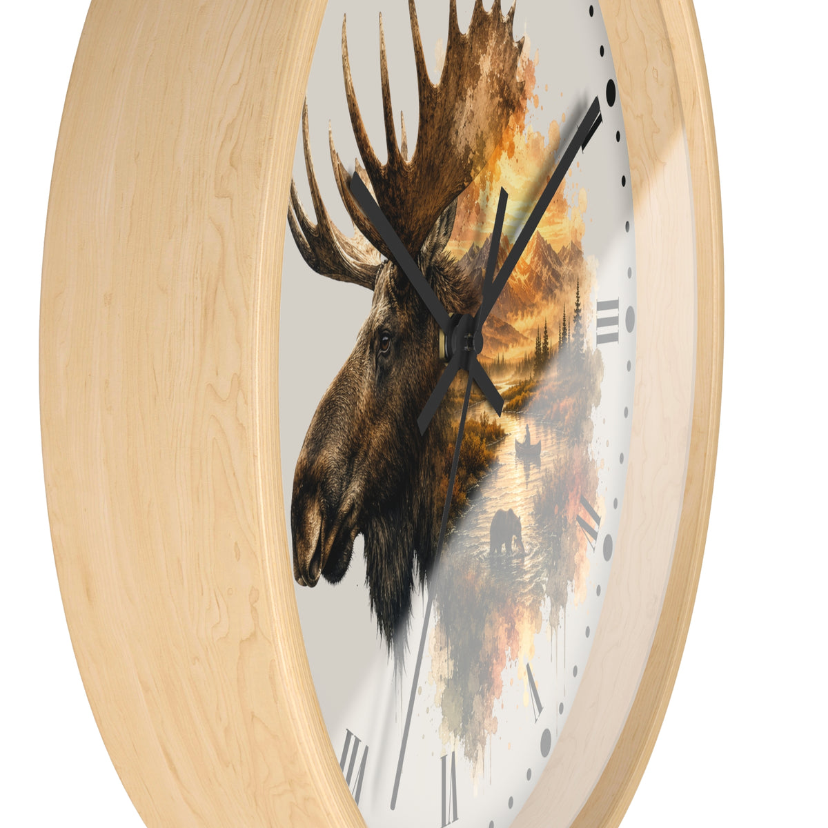 Round wall clock with a light natural wood frame and a printed moose head over a scenic landscape design on the dial, shown against a plain white background.