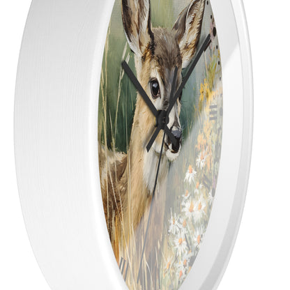 Round wall clock with a white frame and a printed deer in a grassy field design on the face, shown against a plain white background.