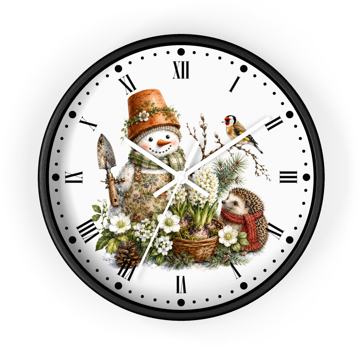 A round wall clock with a black frame and a white face featuring a whimsical winter garden illustration. The design includes a snowman in a terracotta pot hat, a small bird, a hedgehog in a red scarf, white flowers, pinecones, and gardening tools, with black Roman numerals and white hands.