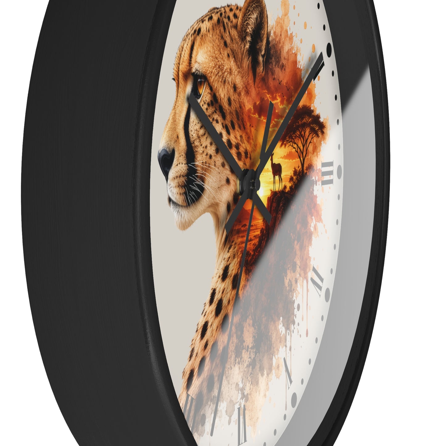 A round wall clock with a black frame and a printed face featuring a cheetah profile blending into an orange sunset scene. The clock is shown at an angle against a plain white background.