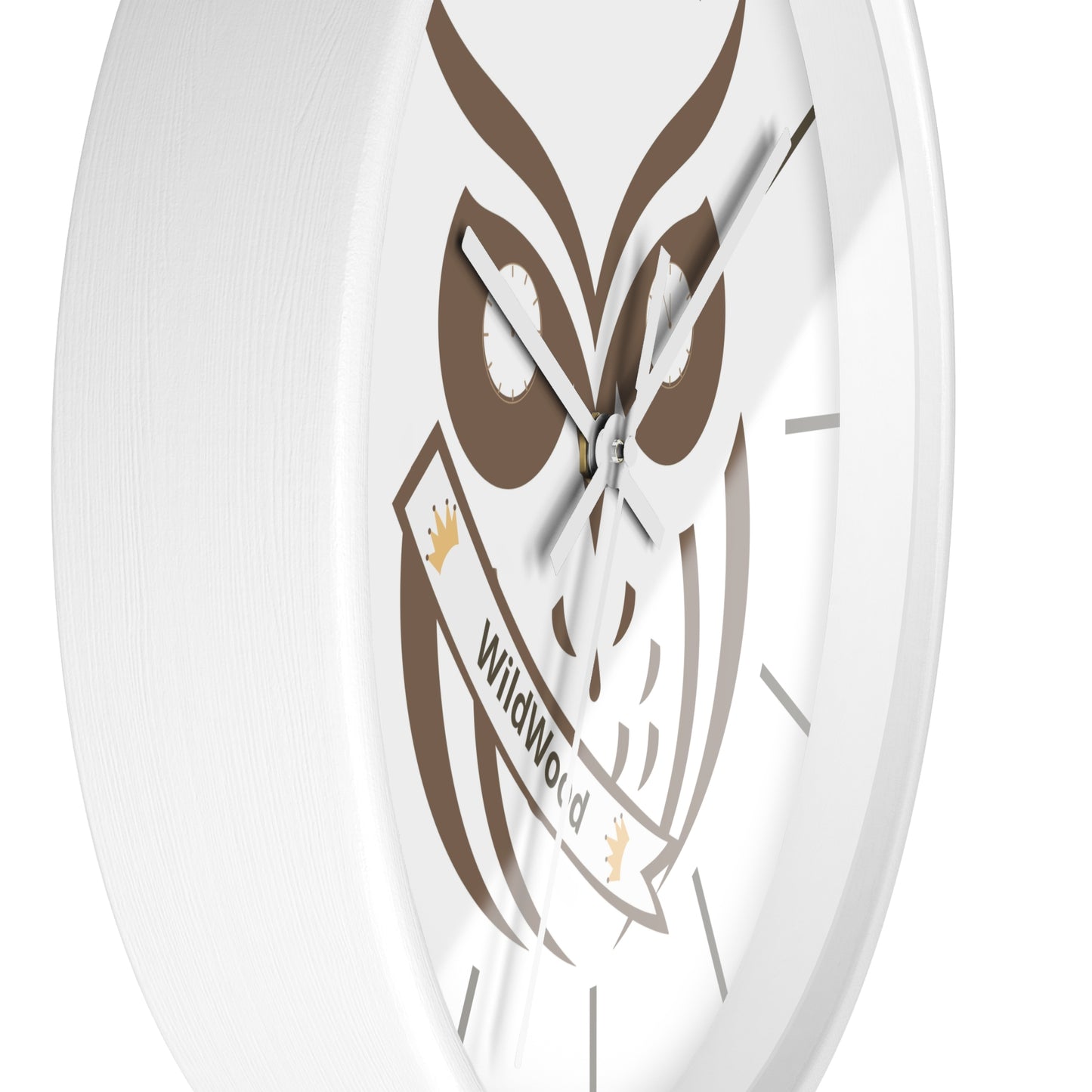 A close-up of a round white wall clock featuring a brown owl graphic and a banner that reads 'WildWorld'.