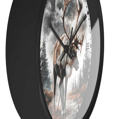 A round wall clock with a black frame and a printed scenic face showing a large deer in a misty forest. The clock is photographed against a plain white background.