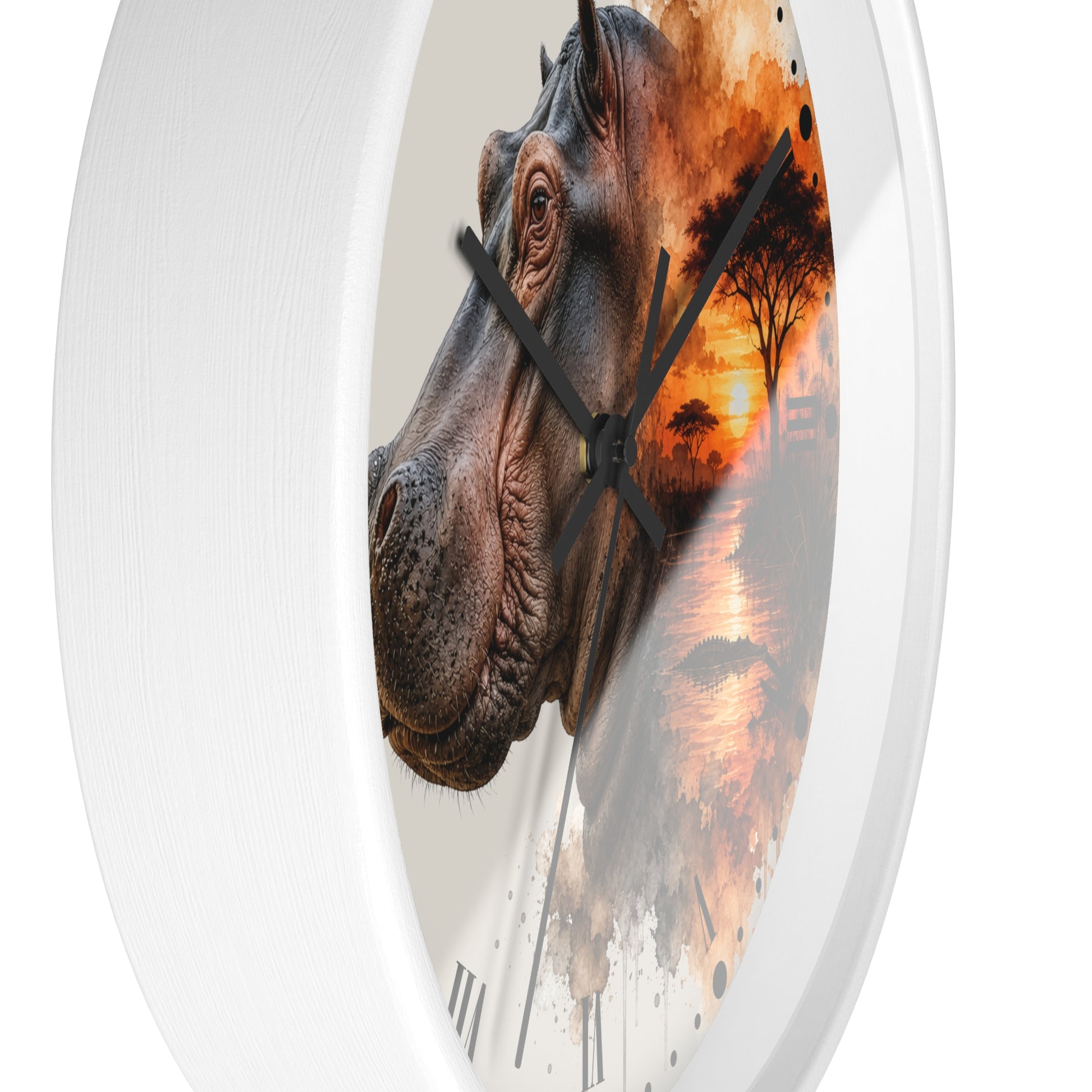 A round wall clock with a white textured frame and a printed face featuring a close-up hippopotamus head layered over an orange sunset landscape with trees and water.