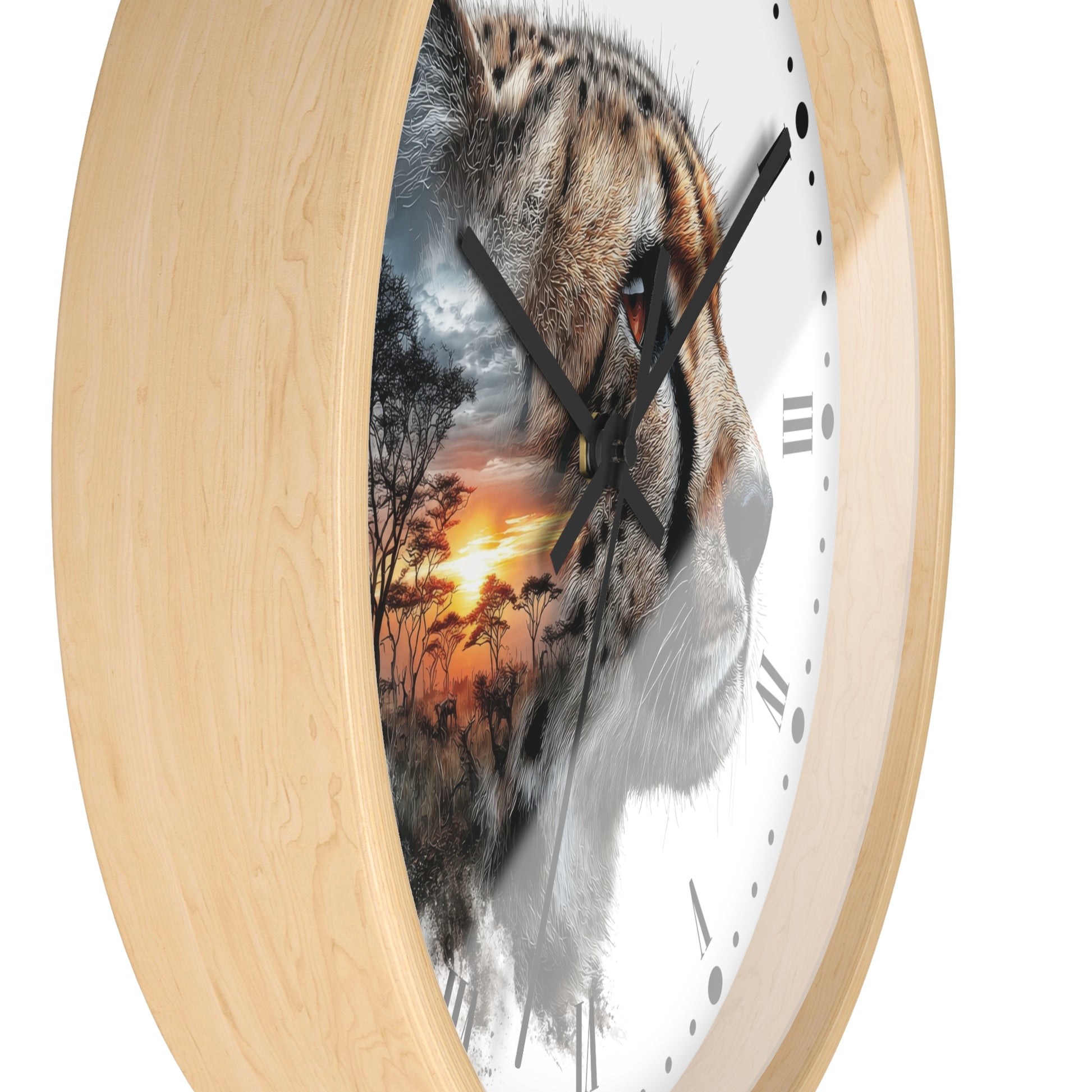 Round wall clock with a light natural wood frame and a white face featuring a cheetah face overlaid with a sunset landscape scene, plus black hands and black Roman numerals.