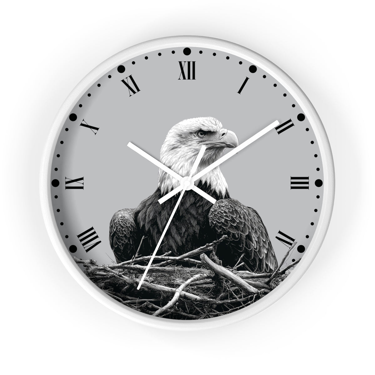 A round wall clock with a white frame and a monochrome photograph of a bald eagle sitting in a nest on the clock face, with black Roman numerals and white hands against a light gray background.