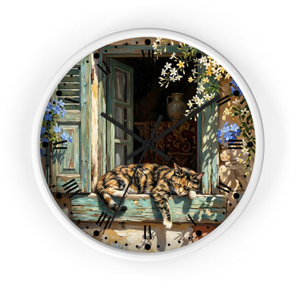 Round wall clock with a white frame and a printed illustration of a tortoiseshell cat sleeping on a weathered blue-green windowsill, with flowers and an open window in the background.