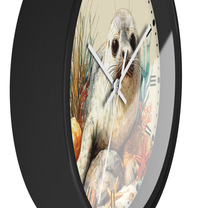 A round wall clock with a black frame and a printed illustration of a seal on the face, shown against a plain white background.
