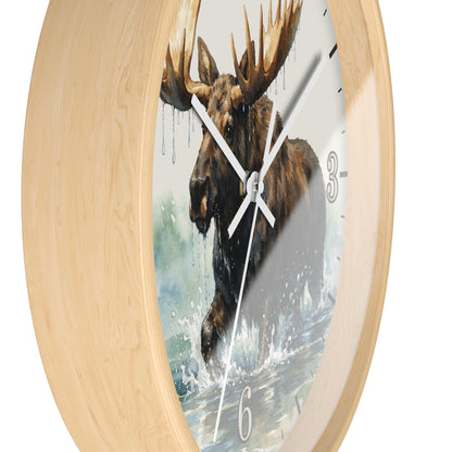 Round wall clock with a light natural wood frame and a printed moose artwork on the face, shown against a plain white background.