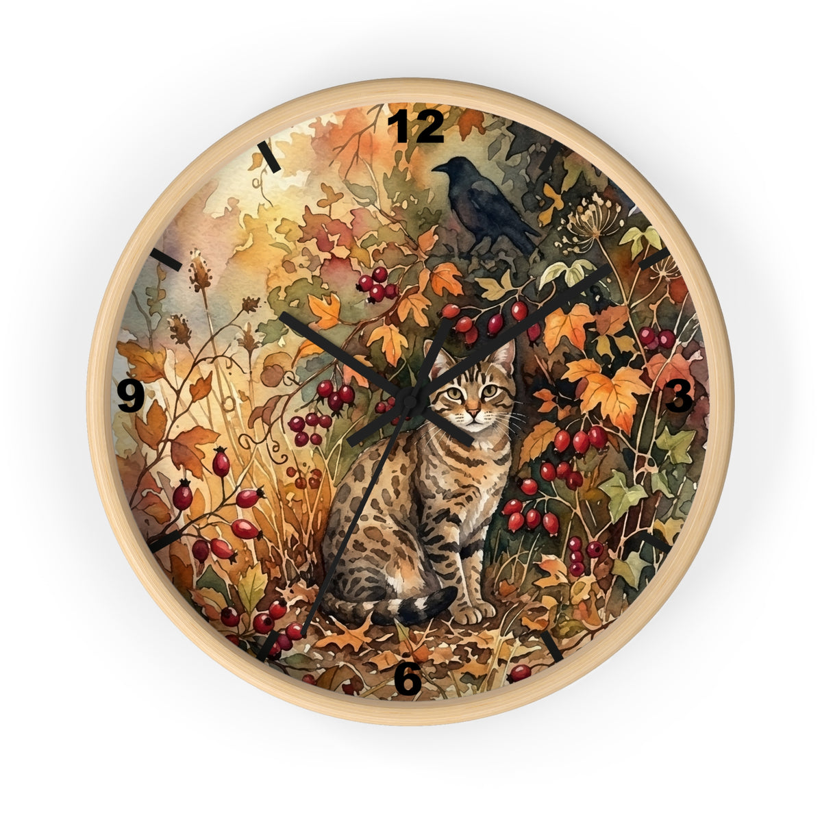Round wall clock with a light natural wood frame and a detailed autumn-themed illustration on the face, featuring a tabby cat, a black bird, red berries, and orange and yellow leaves. The clock is shown against a plain white background.