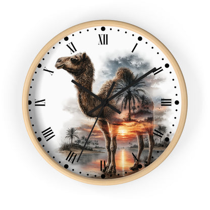 Round wall clock with a light wood frame and black Roman numerals, featuring a printed design of a camel standing in a desert landscape at sunset on the clock face.