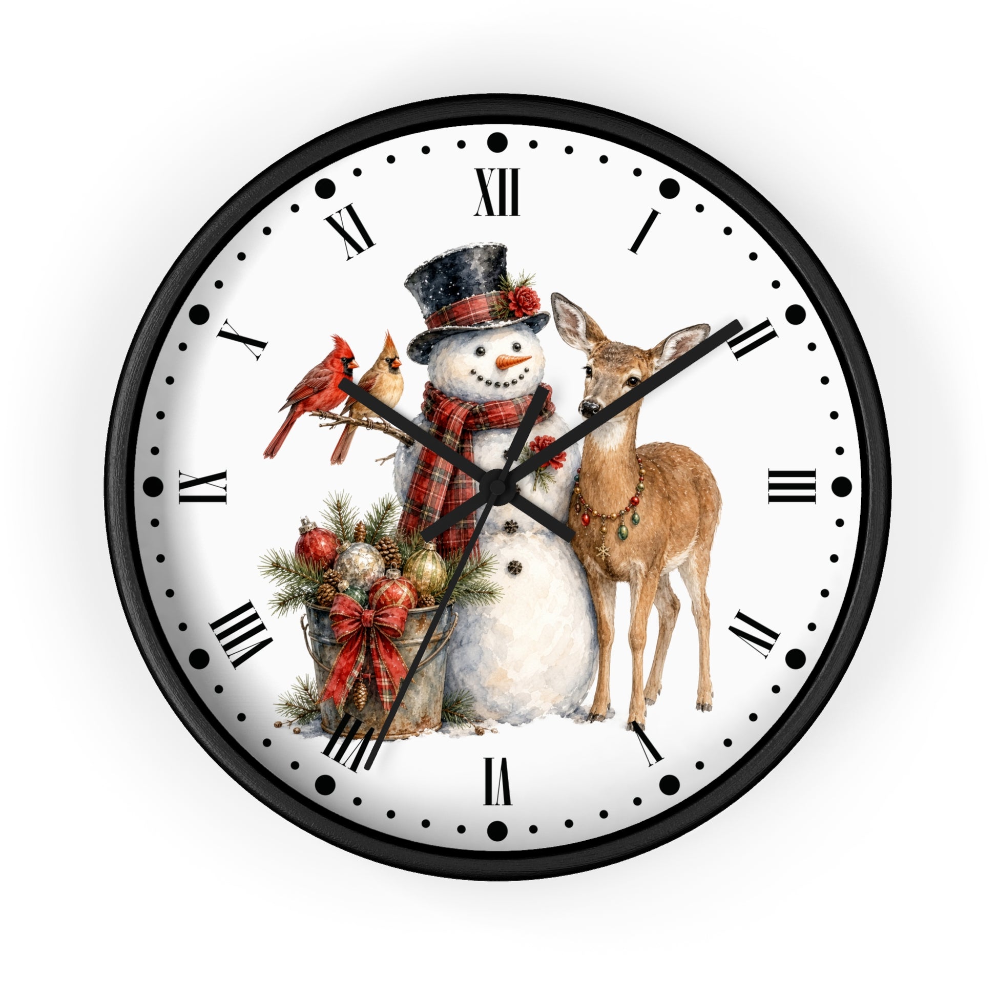A round wall clock with a black frame and a white face featuring a winter holiday illustration of a snowman, a deer, a red cardinal, and a gift basket with Roman numerals and black hour markers.