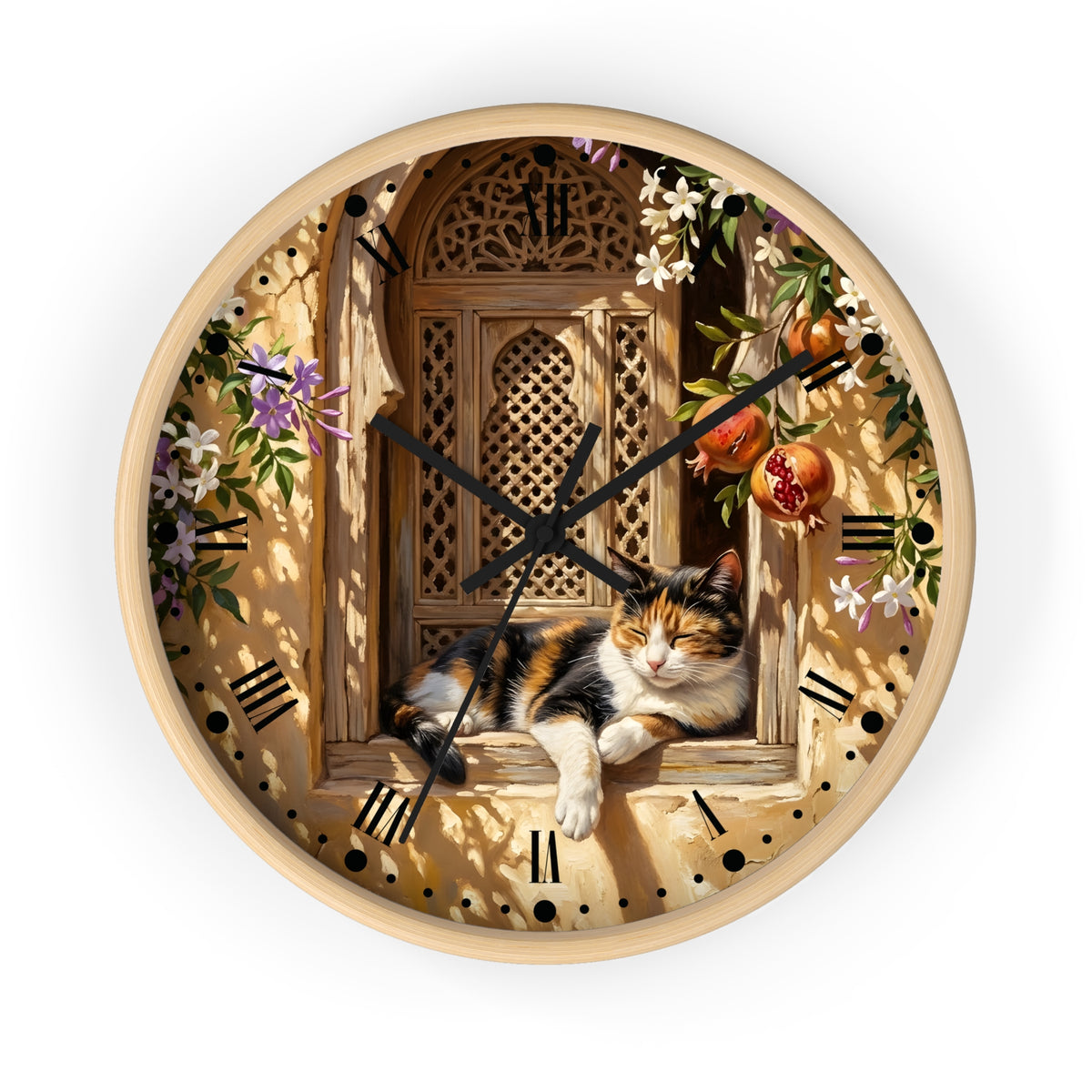 A round wall clock with a light wood frame featuring a printed illustration of a calico cat lounging by an ornate window, surrounded by flowers, leaves, and pomegranates. The clock has black hands and black Arabic numeral hour markers on a white background.