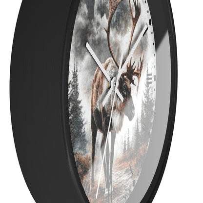 A round wall clock with a black frame and a printed nature scene featuring a large deer in a misty forest. The clock is shown at an angle against a plain white background.