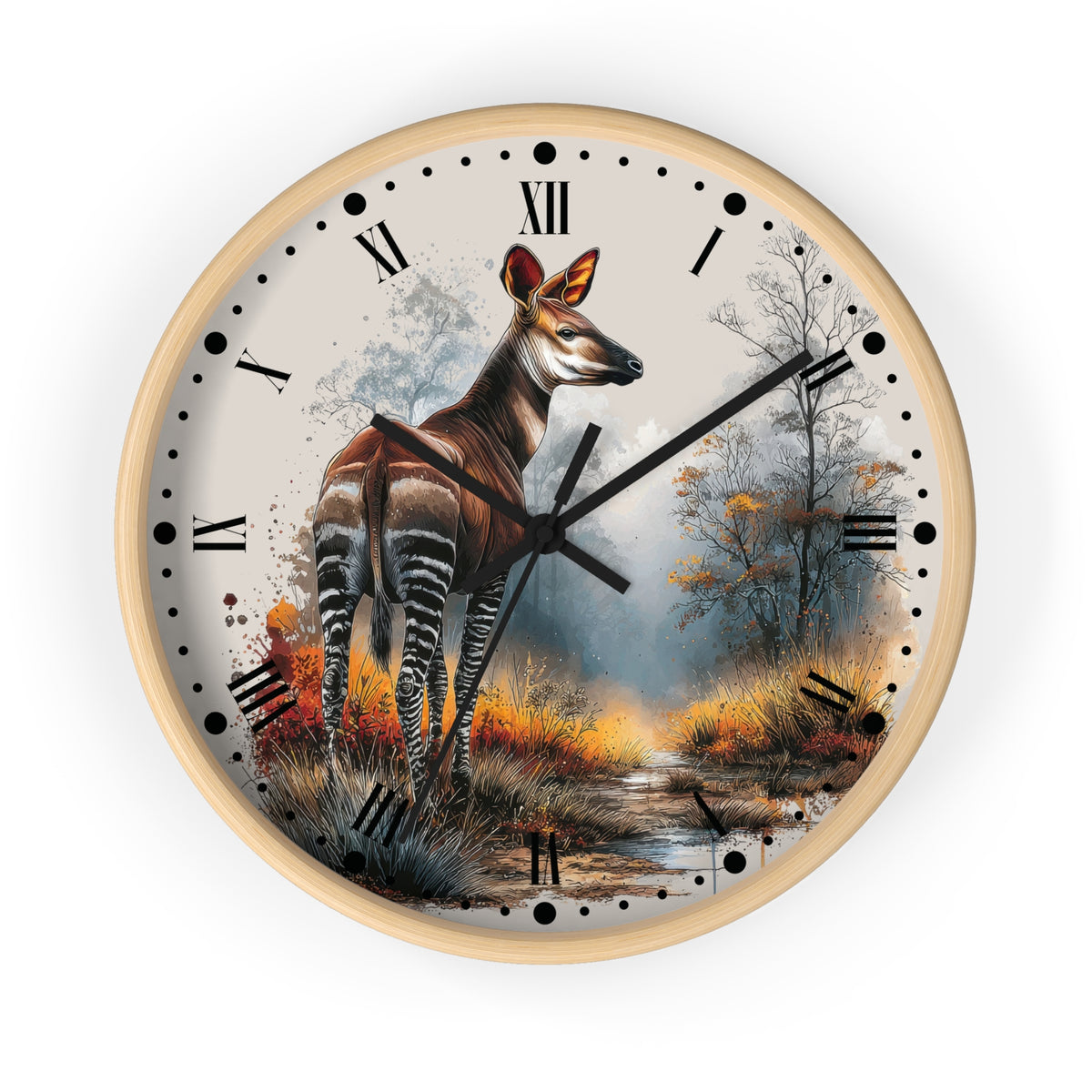 A round wall clock with a light wood frame and a printed nature scene on the face. The artwork shows a Okapi antelope standing in a misty woodland with trees and autumn foliage.