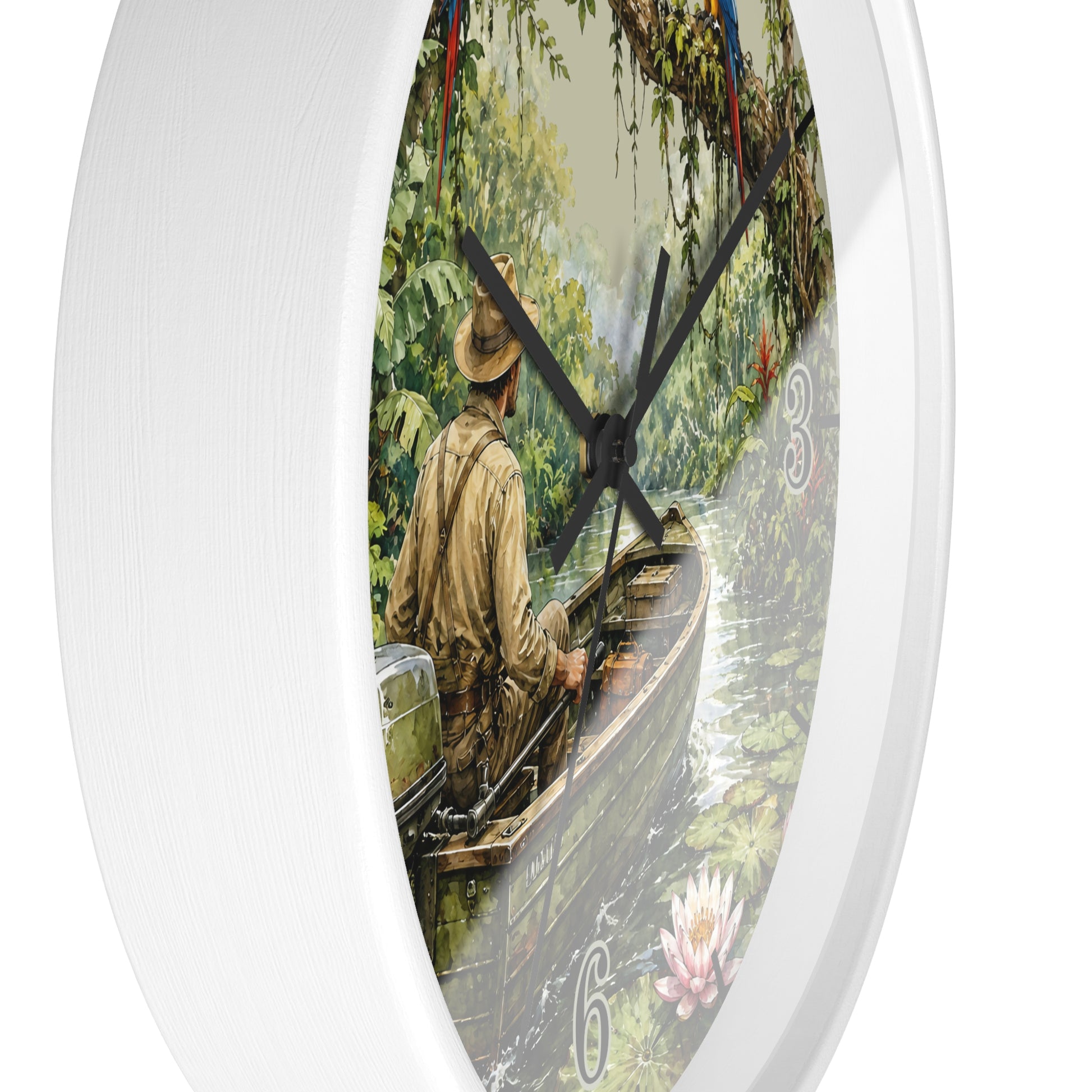 Round wall clock with a white frame and a printed scenic dial showing a man in a boat on a river surrounded by lush greenery. The clock hands are black, and the number 6 is visible near the bottom right of the dial.