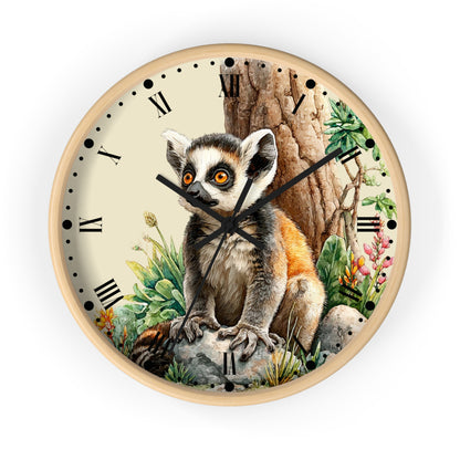 Round wall clock with a light wood frame and a detailed illustration of a ring-tailed lemur sitting in front of a tree trunk, with Roman numerals on a cream background.