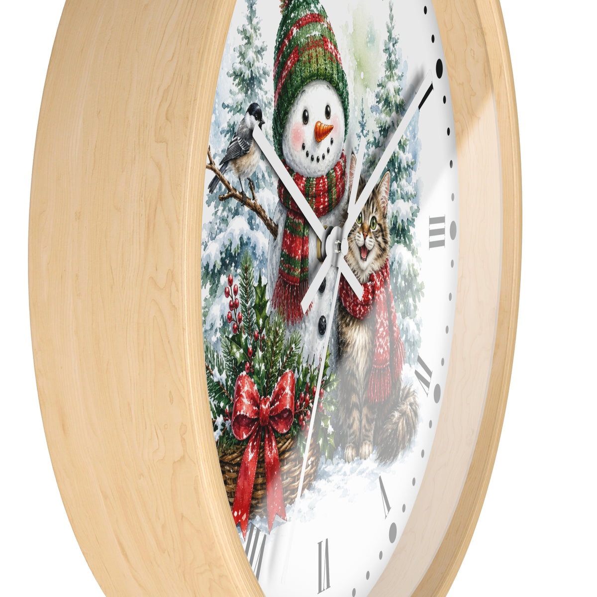 A round wall clock with a light natural wood frame and a white face featuring a winter holiday illustration of a snowman, a cat, a bird, and evergreen trees.