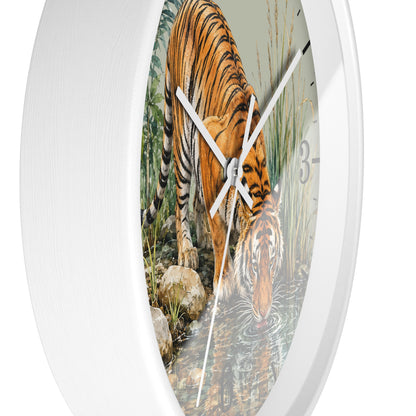 Round wall clock with a white frame and a printed tiger drinking water scene on the face, shown against a plain white background.