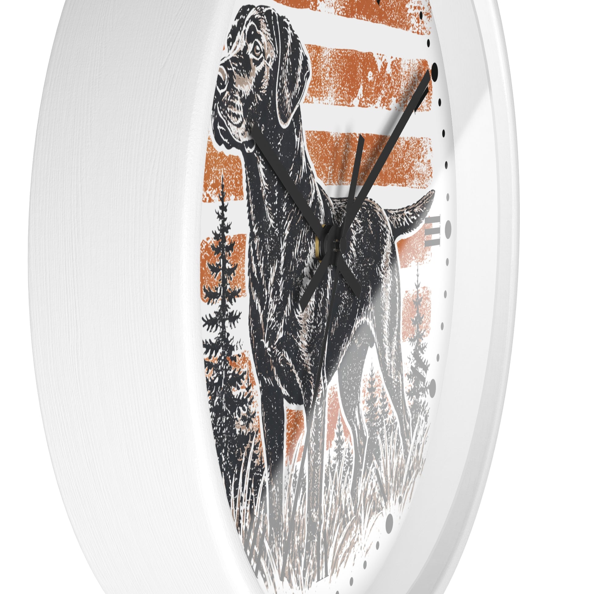Round wall clock with a white frame and a printed design featuring a black dog standing in front of distressed orange and white horizontal stripes, with black hands and black hour markers.