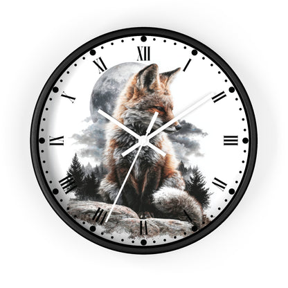 A round wall clock with a black frame and a printed design of a fox sitting in front of a full moon and trees. The clock face is white with black Roman numerals and white hands, shown against a plain white background.