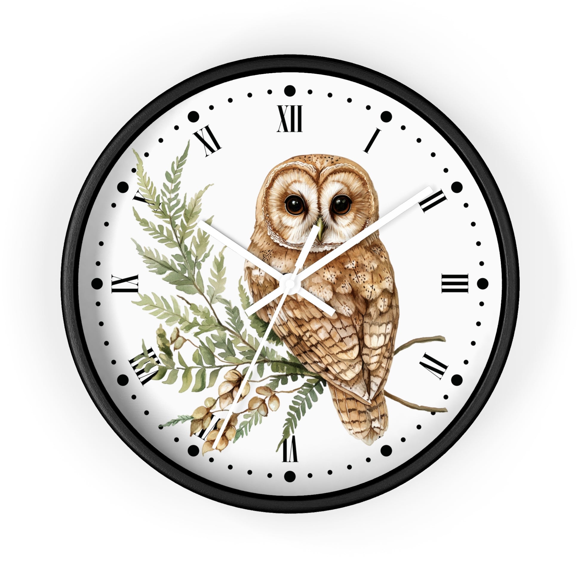 A round wall clock with a black frame and a white face, featuring a detailed illustration of a brown owl perched on a green branch with acorns. The clock uses Roman numerals for hour markers and has white hands.