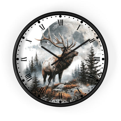 Round wall clock with a black frame and Roman numeral hour markers, featuring a printed nature scene of a large deer with antlers standing in a misty forest under a full moon.