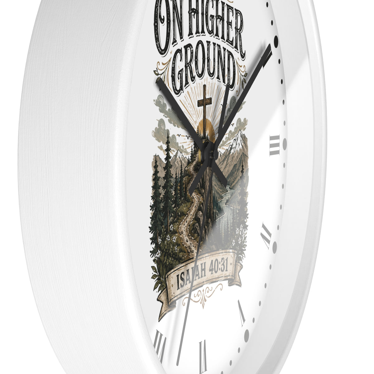 A white round wall clock featuring a scenic mountain and forest illustration with the text 'ON HIGHER GROUND' and 'ISAAC 40:31' on the dial.