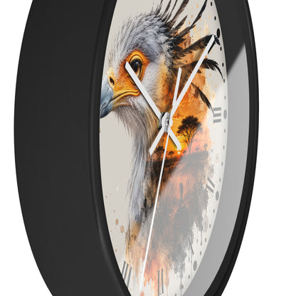 A close-up of a round wall clock with a black frame and a printed face featuring a detailed bird of prey illustration in gray, orange, and black tones with white clock hands and Roman numerals.