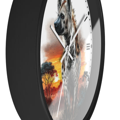 A round wall clock with a black frame and a printed design of a hyena over an African savanna sunset scene, shown against a plain white background.