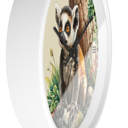 Round wall clock with a white frame and a printed illustration of a ring-tailed lemur on the face, shown against a plain white background.
