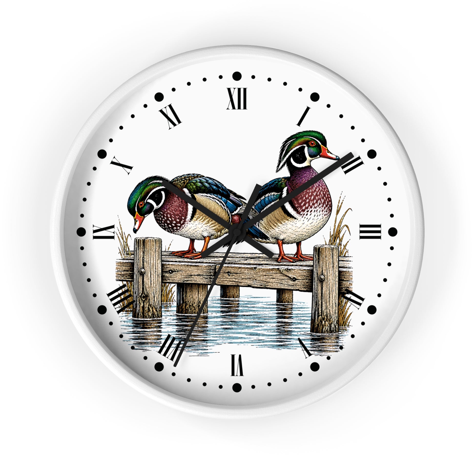 Round wall clock with a white face featuring an illustration of two colorful wood ducks standing on a wooden dock over water, with black Roman numerals and hands on a white background.