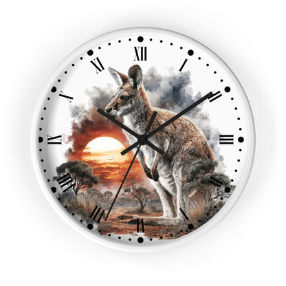 A round wall clock with a white frame and a printed scenic design featuring a kangaroo in front of a dramatic sunset over a landscape, with black Roman numerals and hands on a white background.
