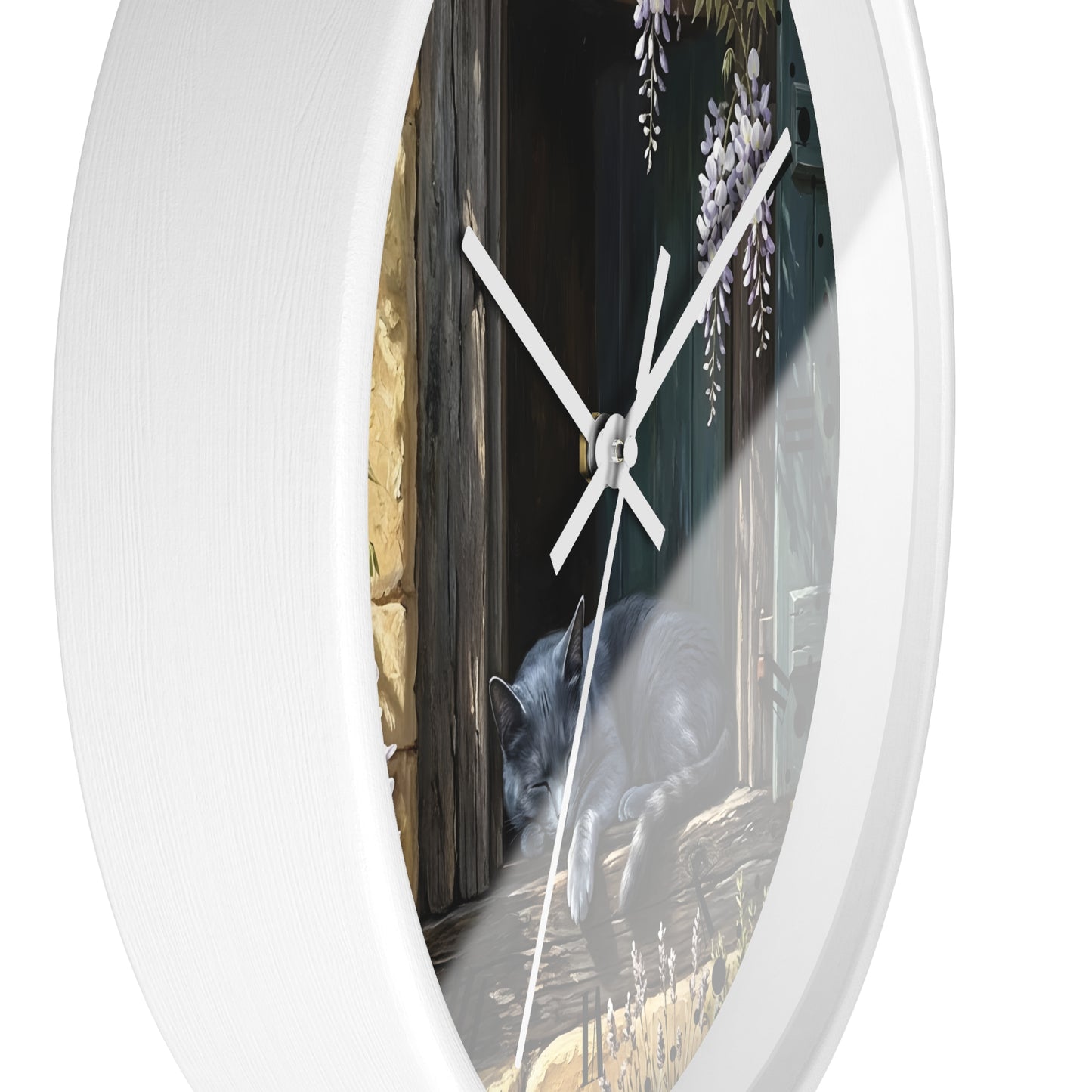 Round white wall clock with a printed scenic face showing a gray cat at a wooden door and wisteria flowers, photographed against a white background.