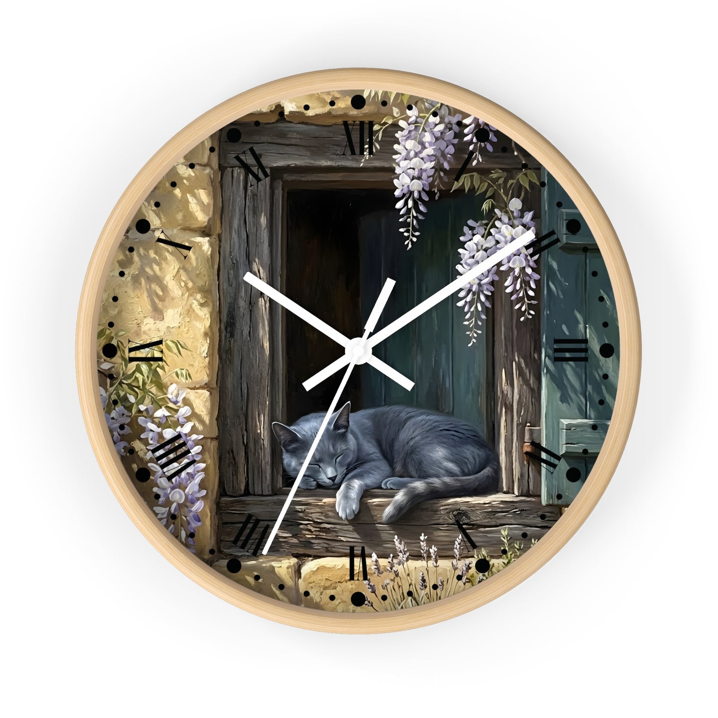 Round wall clock with a light wood frame and a printed illustration of a gray cat sleeping on a rustic wooden windowsill, surrounded by wisteria flowers and stone-textured details. White clock hands and black Roman numerals are visible against a plain white background.