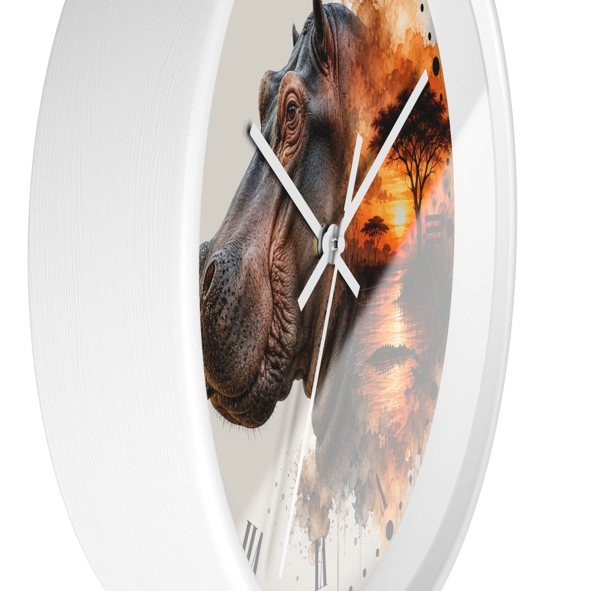 A round wall clock with a white frame and a printed design featuring a close-up hippopotamus face on the left and an orange-toned sunset landscape on the right, shown against a plain white background.