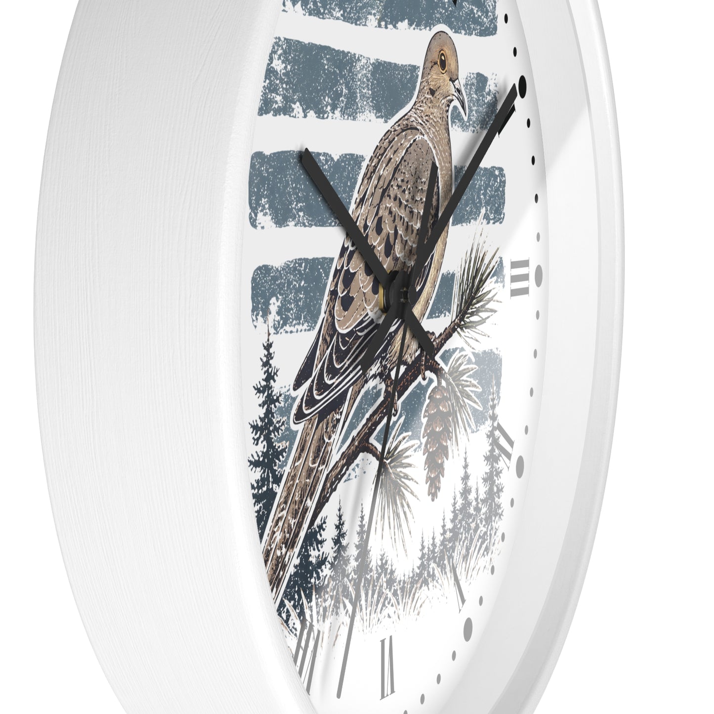 White round wall clock with a printed nature design featuring a brown dove bird perched on a pine branch against a blue and white striped background, with black hands and black Roman numerals.
