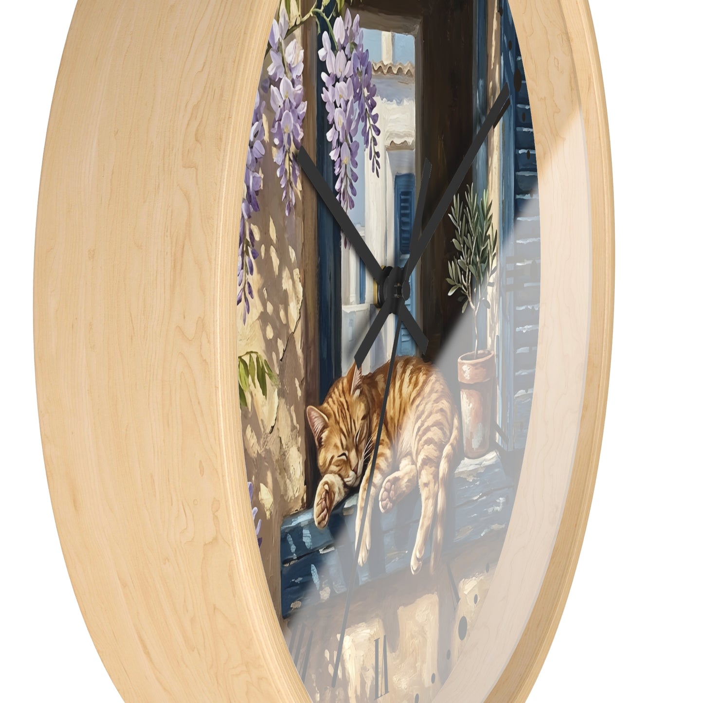Oval wall clock with a light natural wood frame and a printed illustration of an orange tabby cat sleeping on a windowsill with purple wisteria flowers and a blue-toned window scene.
