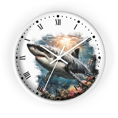 A round wall clock with a white frame and a printed shark underwater scene on the face, with black Roman numerals and black dot hour markers on a white background.