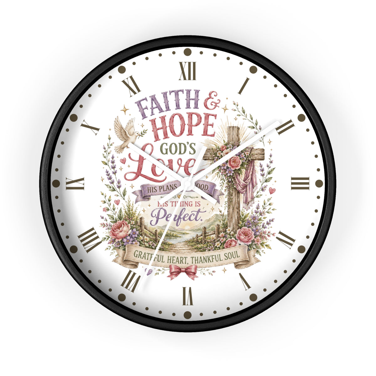 A round wall clock with a black frame and a white face featuring a Christian-themed floral and cross illustration with Roman numerals and the words 'Faith & Hope God's Love' and 'This Plan is Perfect.'.