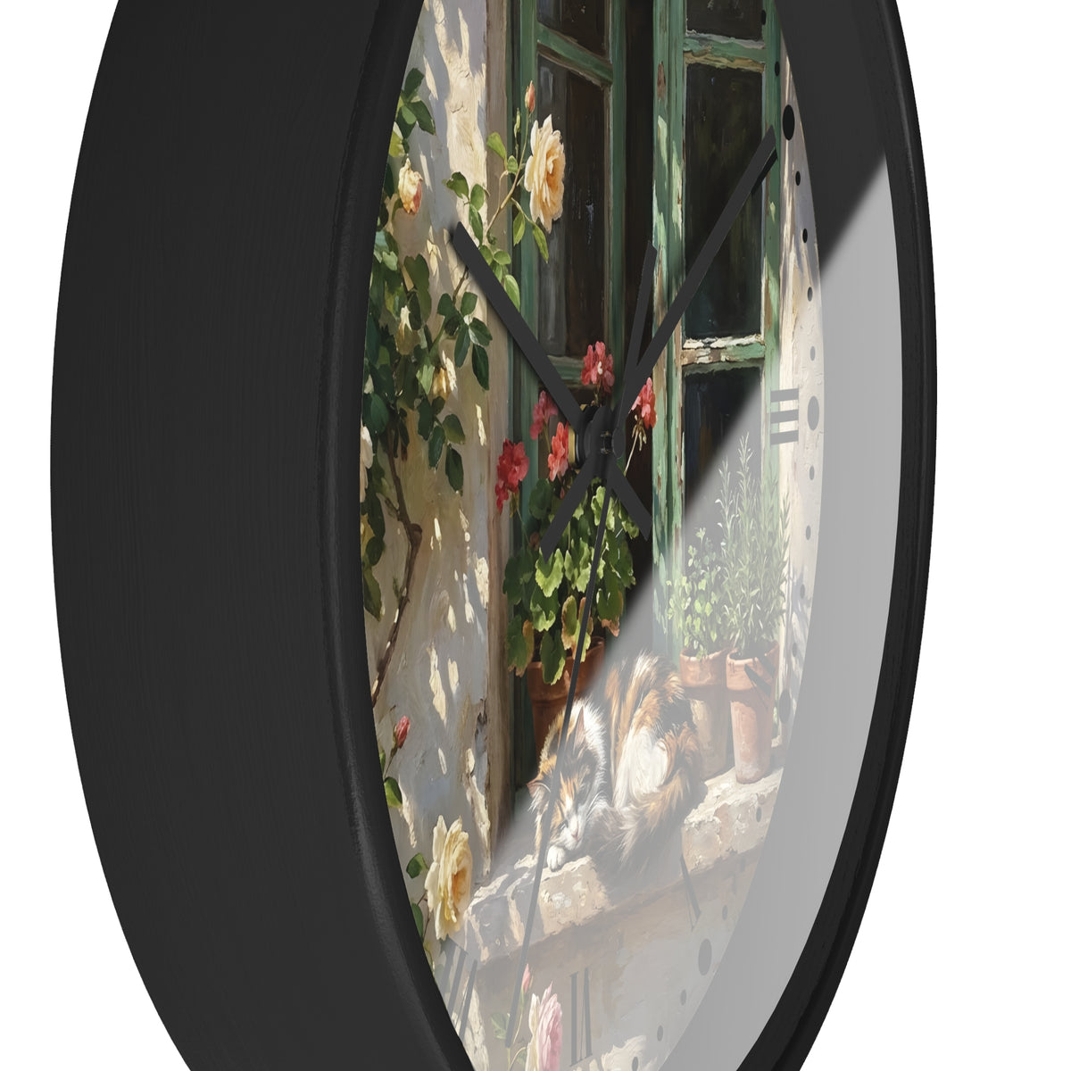A round wall clock with a black frame and a printed scenic face showing a sunlit stone wall, green window frame, climbing roses, flowers, and a cat on a windowsill.