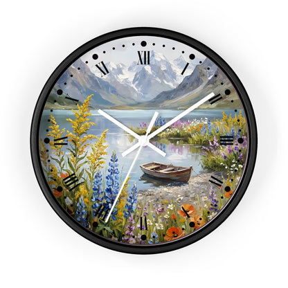 Round wall clock with a black frame and a scenic landscape print featuring a mountain lake, snowy peaks, wildflowers, a rowboat, and Roman numeral hour markers.