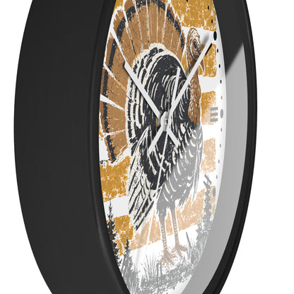 A round wall clock with a black frame and a distressed graphic of a turkey on the face, shown at an angle against a white background.