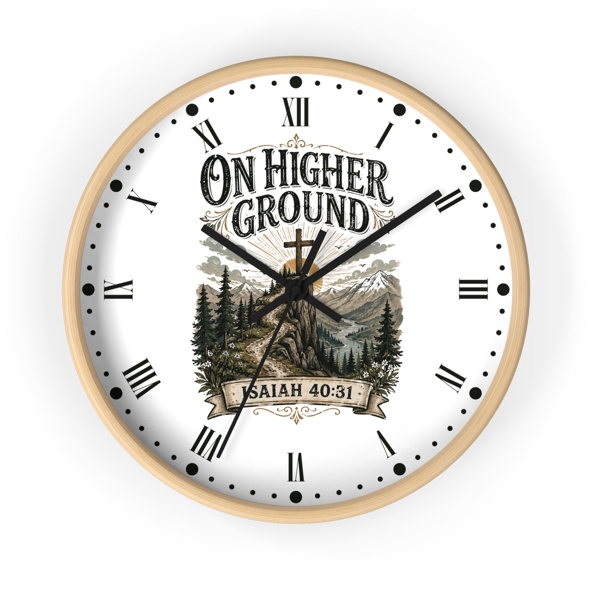 A round wall clock with a light natural wood frame, white face, black Roman numerals, and a scenic graphic featuring mountains, pine trees, and a cross. The text on the clock reads 'ON HIGHER GROUND' and 'SAITH 40:31'.