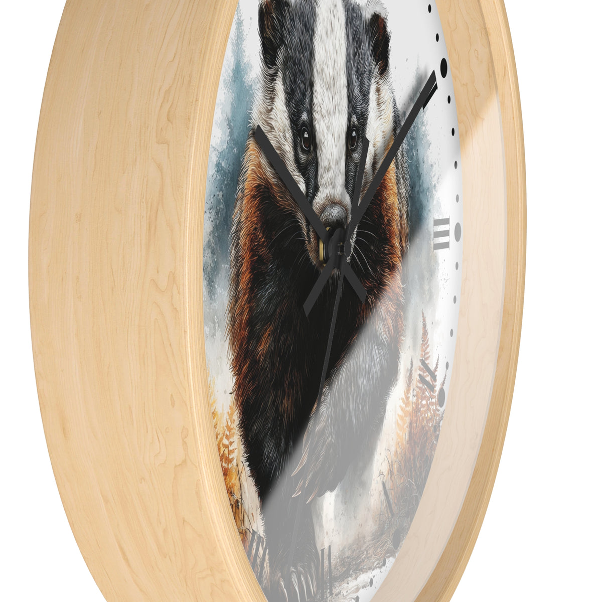 A round wall clock with a light natural wood frame and a printed face showing a badger in a forest scene, photographed against a plain white background.