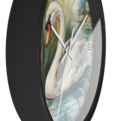 Round wall clock with a black frame and a printed swan painting on the face, shown against a plain white background.