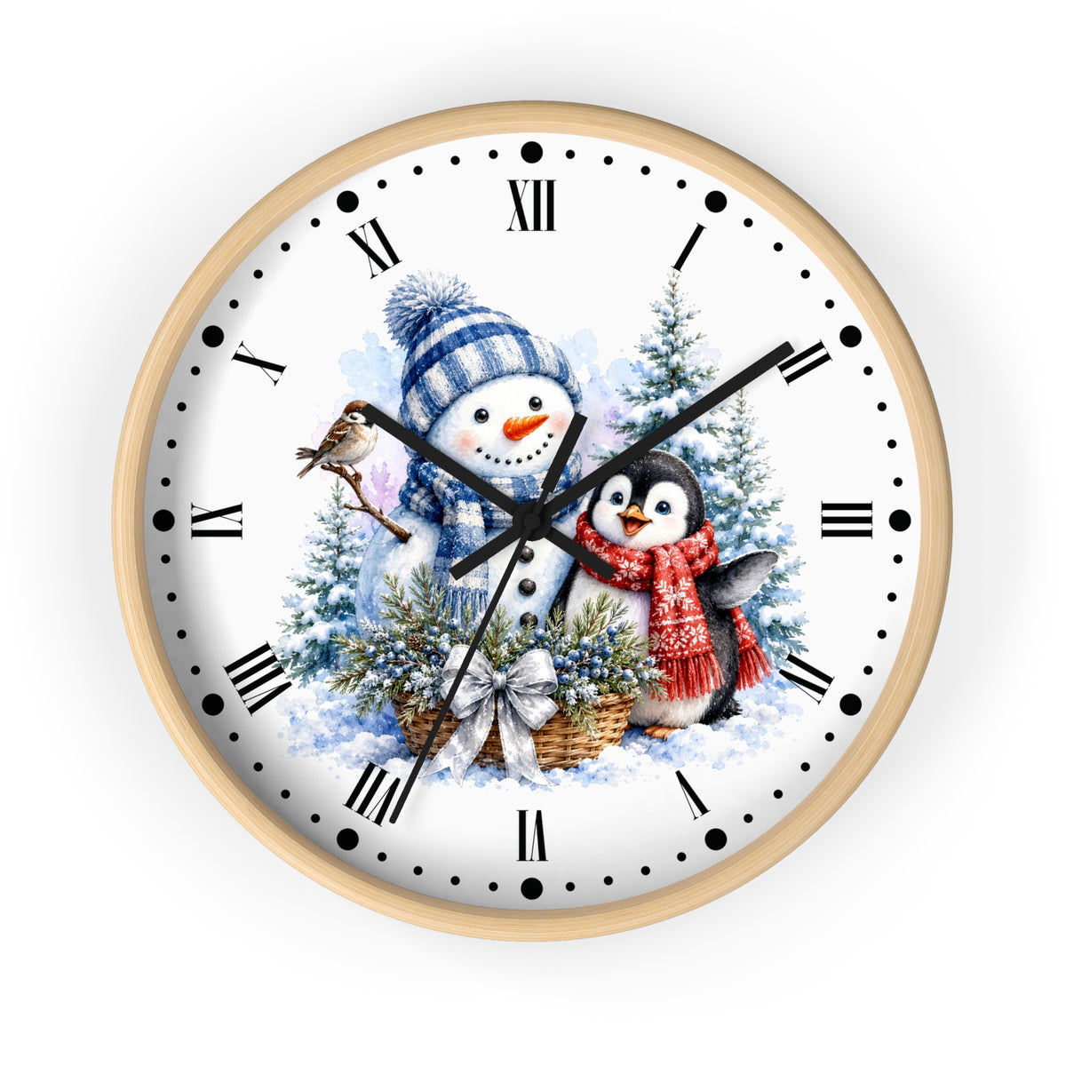 A round wall clock with a light wood frame and a white face featuring a winter holiday illustration of a snowman and a penguin among snowy trees. The clock has black Roman numerals, black dot hour markers, and black hands.