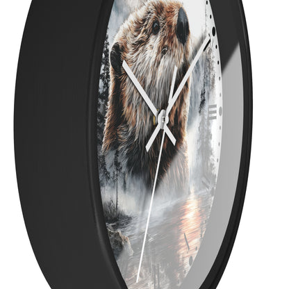 A round wall clock with a black frame and a printed nature scene on the face showing a beaver in a misty forest, photographed against a plain white background.